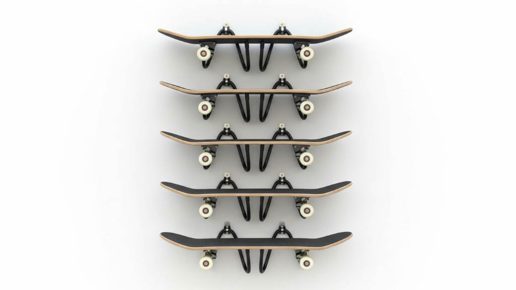 YYST W-Style skateboard wall mounts installed vertically holding multiple decks on a white wall, showcasing adjustable metal arms for secure storage