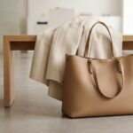 Classic leather handbag collection on wooden shelf